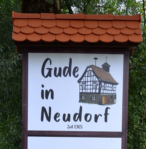 Gude in Neudorf, eine humorvolle hessische Begrüßung